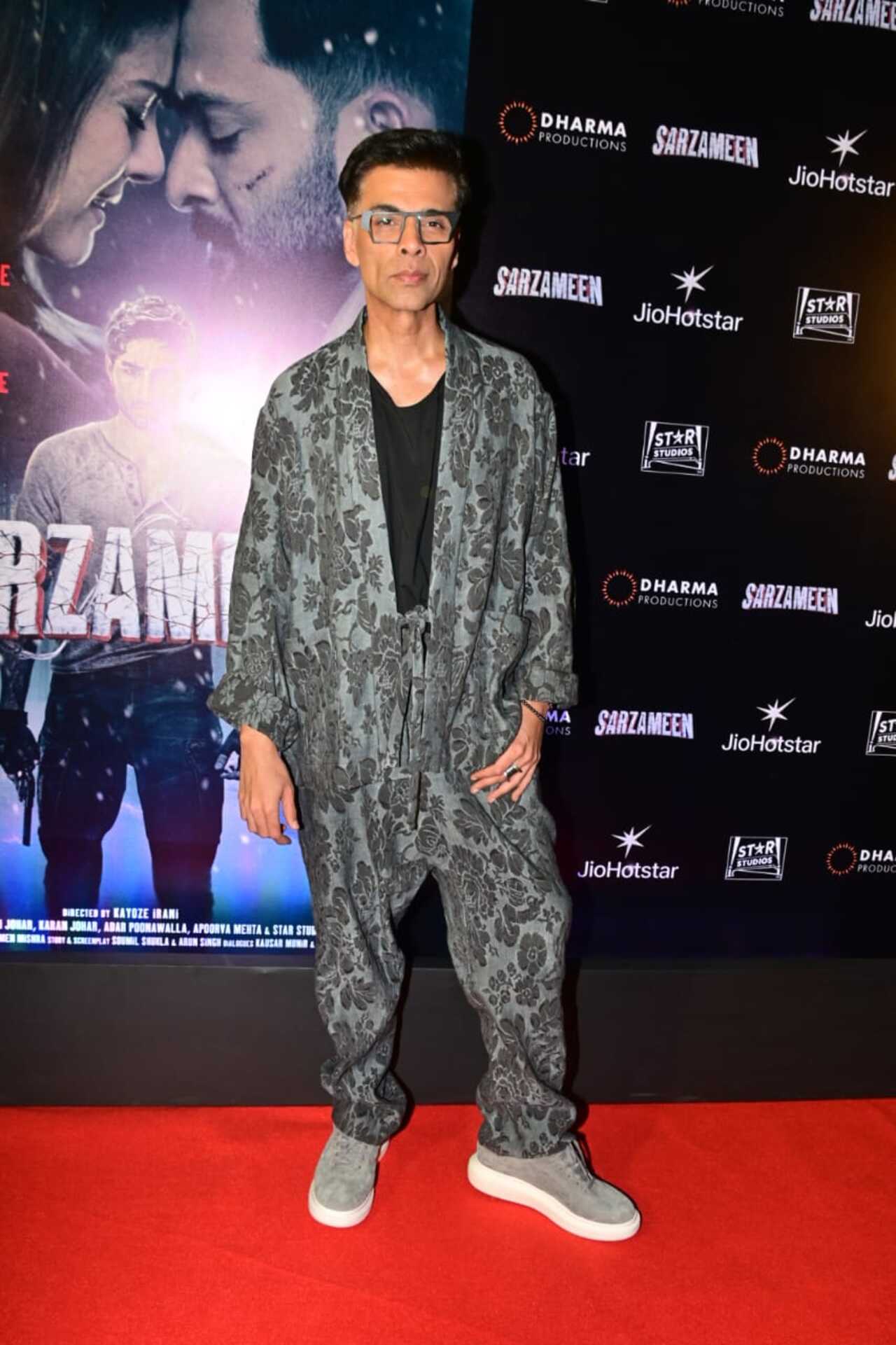 Karan Johar arrived at the screening of Sarzameen. He exuded his signature quirky vibes in this grey co-ord set with jacquard pattern. She paired the look with sneakers and statement rings. 